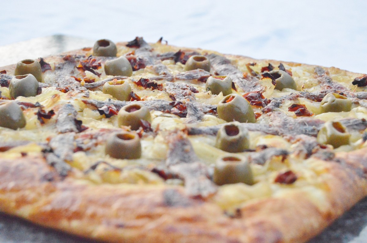 Croissaladière (anchovies, olives, confit shallots on croissant&nbsp;dough)