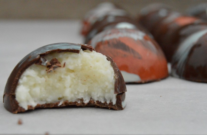 200g condensed milk with 300g desiccated coconut. Perhaps with a little vanilla bean paste and splash of rum.